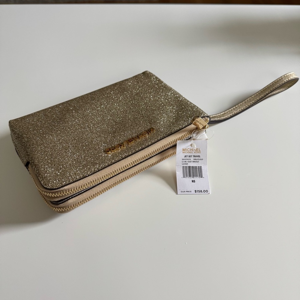 NWT Michael Kors Jet Set Travel gold wristlet with two zipper pockets
